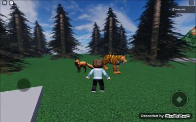 Szene in CoSpaces: Mädchen trifft Tiger und Fuchs im Wald.